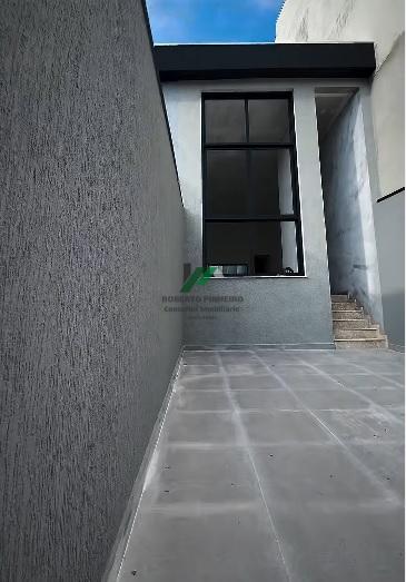 Casa à venda com 3 quartos, 100m² - Foto 2